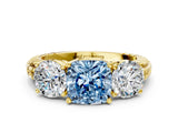 Yellow gold Three-Stone Fancy Blue Cushion Cut Cut Diamond Ring with Channel-Set Band and Prong Setting