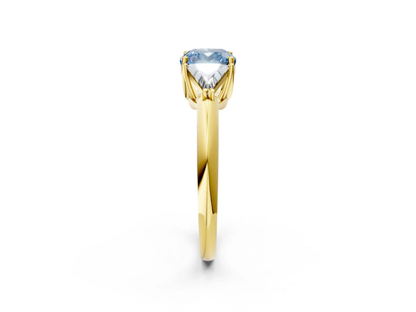 Yellow gold Three-Stone Fancy Blue Cushion Cut Cut Diamond Ring with Trillion Side Stones and Four-Prong Setting