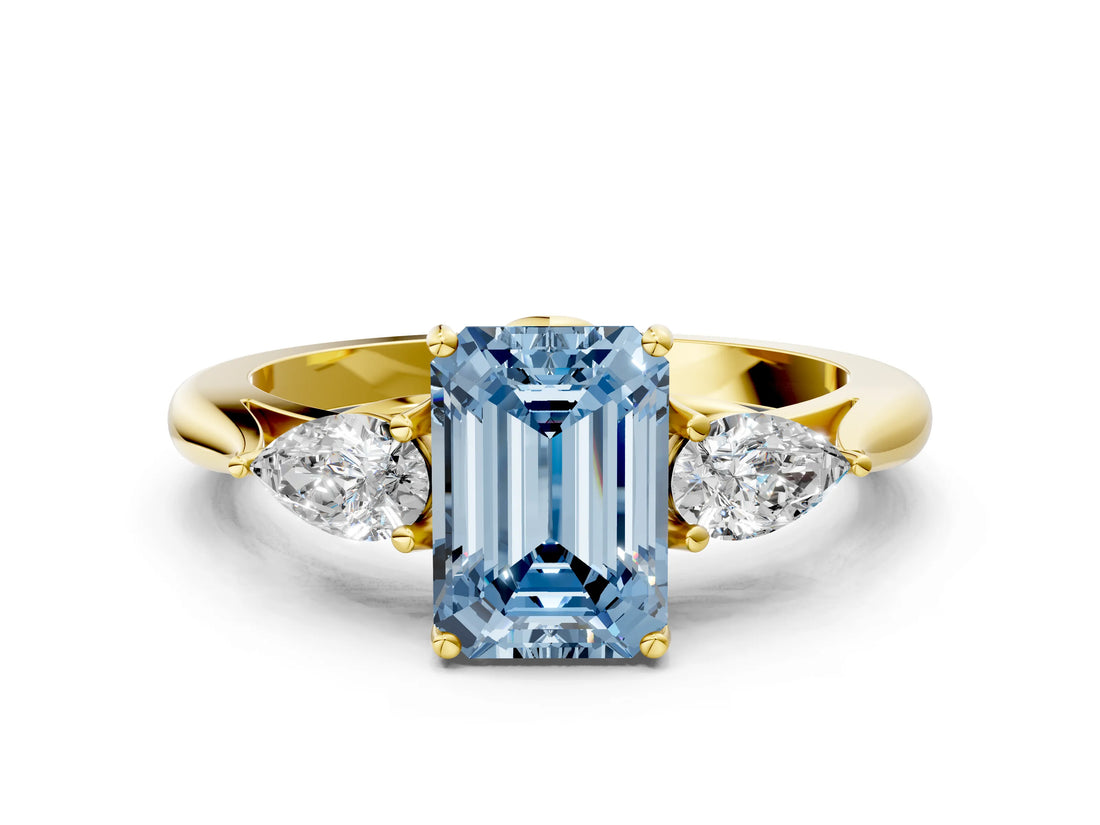 Yellow gold Three-Stone Fancy Blue Emerald Cut Brilliant Diamond Solitaire Ring with Tapered Band and Four-Prong Setting_12