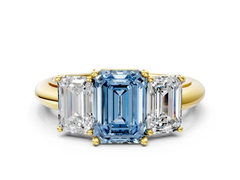 Yellow gold Three-Stone Fancy Blue Emerald Cut Cut Diamond Engagement Ring with Prong Setting on a White Gold Band