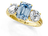 Yellow gold Three-Stone Fancy Blue Emerald Cut Cut Diamond Ring with Channel-Set Band and Prong Setting_1