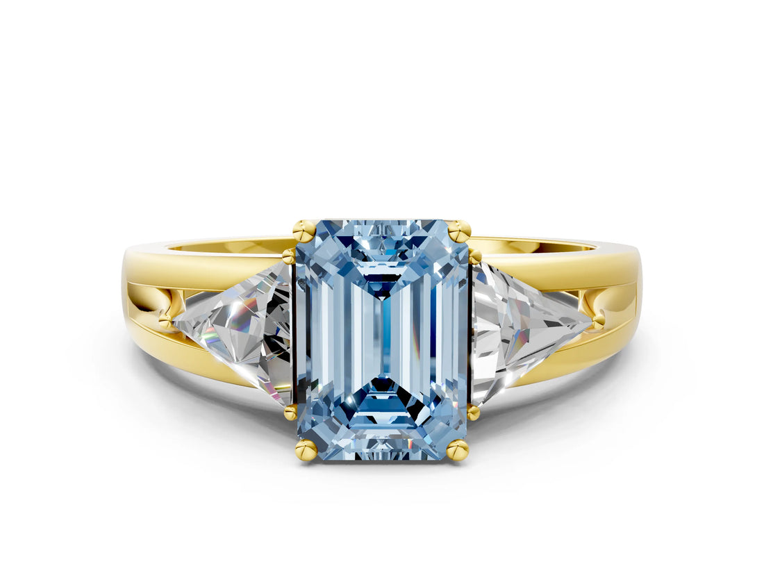 Yellow gold Three-Stone Fancy Blue Emerald Cut Cut Diamond Ring with Trillion Side Stones on a Split Shank Band