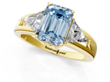 Yellow gold Three-Stone Fancy Blue Emerald Cut Cut Diamond Ring with Trillion Side Stones on a Split Shank Band_1