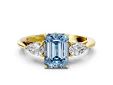 Yellow gold Three-Stone Fancy Blue Emerald Cut Diamond Ring with Pear  Side Stones in Four-Prong Setting_48