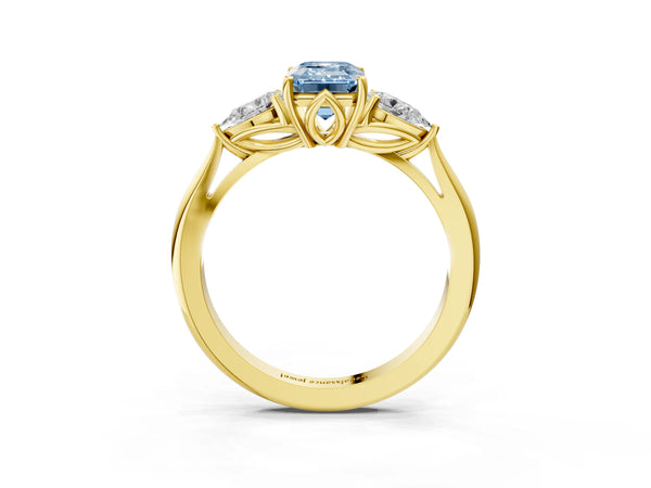 Yellow gold Three-Stone Fancy Blue Emerald Cut Diamond Ring with Pear  Side Stones in Four-Prong Setting