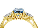 Yellow gold Three-Stone Fancy Blue Emerald Cut Diamond Ring with Pear  Side Stones in Four-Prong Setting_52