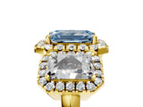 Yellow gold Three-Stone Fancy Blue Emerald Cut Halo Diamond Ring with Pave Band and Four-Prong Setting_5