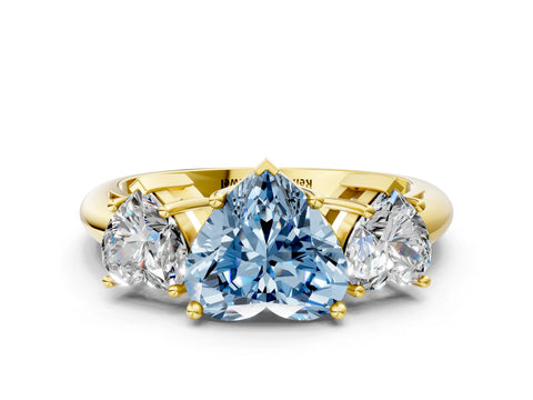 Yellow gold Three-Stone Fancy Blue Heart Cut Cut Diamond Engagement Ring with Prong Setting on a White Gold Band