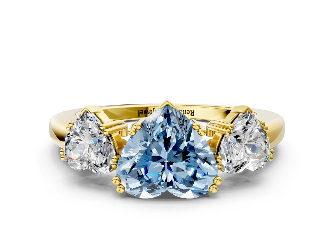 Yellow gold Three-Stone Fancy Blue Heart Cut Cut Diamond Ring with Channel Set Band and Four-Prong Setting