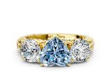 Yellow gold Three-Stone Fancy Blue Heart Cut Cut Diamond Ring with Channel-Set Band and Prong Setting
