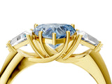 Yellow gold Three-Stone Fancy Blue Heart Cut Cut Diamond Ring with Trillion Side Stones and Four-Prong Setting_7