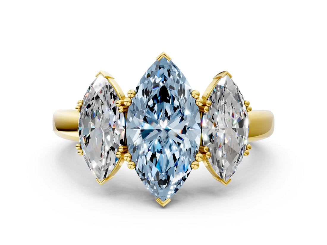 Yellow gold Three-Stone Fancy Blue Marquise Cut Cut Diamond Ring with Channel Set Band and Four-Prong Setting