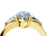 Yellow gold Three-Stone Fancy Blue Marquise Cut Cut Diamond Ring with Trillion Side Stones on a Split Shank Band_4