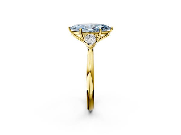 Yellow gold Three-Stone Fancy Blue Marquise  Cut Diamond Ring with Pear Side Stones in Four-Prong Setting
