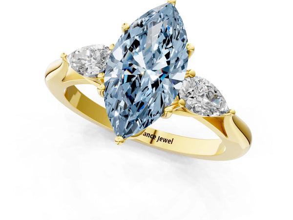 Yellow gold Three-Stone Fancy Blue Marquise Cut Diamond Ring with Pear  Side Stones in Four-Prong Setting