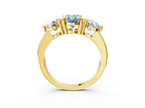 Yellow gold Three-Stone Fancy Blue Oval  Brilliant Cut Solitaire Ring with Prong Setting on a Classic Band