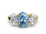 Yellow gold Three-Stone Fancy Blue Oval Cut Cut Diamond Engagement Ring with Flat Band and Four-Prong Setting_12