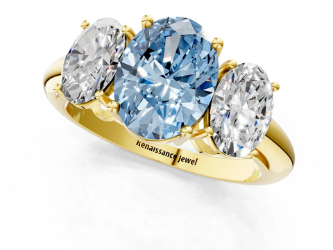 Yellow gold Three-Stone Fancy Blue Oval Cut Cut Diamond Engagement Ring with Prong Setting on a White Gold Band_1
