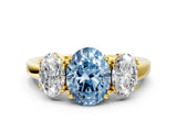 Yellow gold Three-Stone Fancy Blue Oval Cut Cut Diamond Ring with Channel Set Band and Four-Prong Setting_24