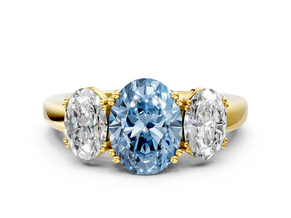 Yellow gold Three-Stone Fancy Blue Oval Cut Cut Diamond Ring with Channel Set Band and Four-Prong Setting