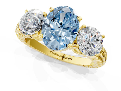 Yellow gold Three-Stone Fancy Blue Oval Cut Cut Diamond Ring with Channel-Set Band and Prong Setting_1