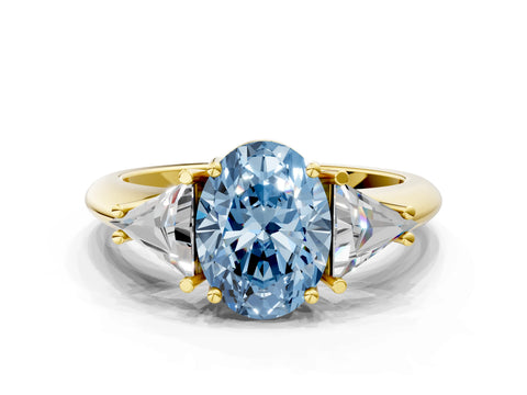 Yellow gold Three-Stone Fancy Blue Oval Cut Cut Diamond Ring with Trillion Side Stones and Four-Prong Setting_3