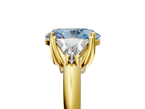 Yellow gold Three-Stone Fancy Blue Oval Cut Cut Diamond Ring with Trillion Side Stones and Four-Prong Setting_8