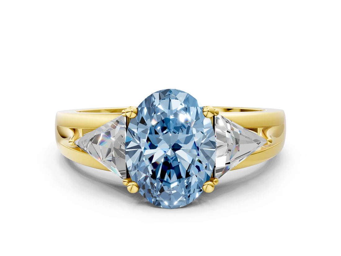Yellow gold Three-Stone Fancy Blue Oval Cut Cut Diamond Ring with Trillion Side Stones on a Split Shank Band