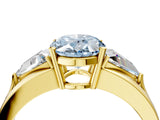 Yellow gold Three-Stone Fancy Blue Oval Cut Cut Diamond Ring with Trillion Side Stones on a Split Shank Band_4