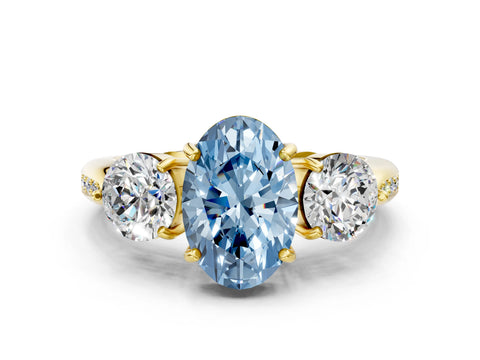 Yellow gold Three-Stone Fancy Blue Oval Cut Diamond Channel Set Engagement Ring with Prong Setting