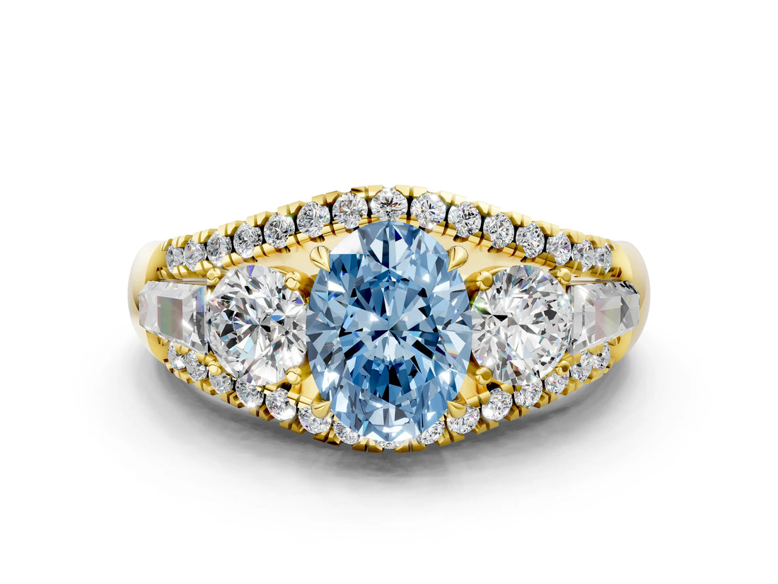 Yellow gold Three-Stone Fancy Blue Oval Cut Diamond Engagement Ring with Pave Band and Prong Setting