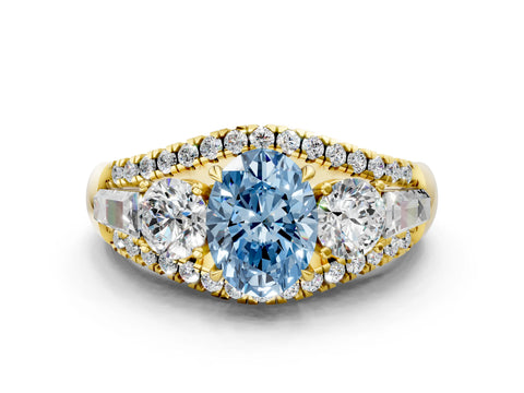 Yellow gold Three-Stone Fancy Blue Oval Cut Diamond Engagement Ring with Pave Band and Prong Setting