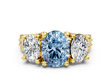 Yellow gold Three-Stone Fancy Blue Oval  Cut Diamond Ring with Channel-Set Band and Four-Prong Setting_66
