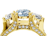 Yellow gold Three-Stone Fancy Blue Oval  Cut Diamond Ring with Channel-Set Band and Four-Prong Setting_70
