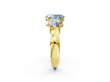 Yellow gold Three-Stone Fancy Blue Oval Cut Diamond Ring with Round Side Stones, Classic Band, and Four-Prong Setting_2