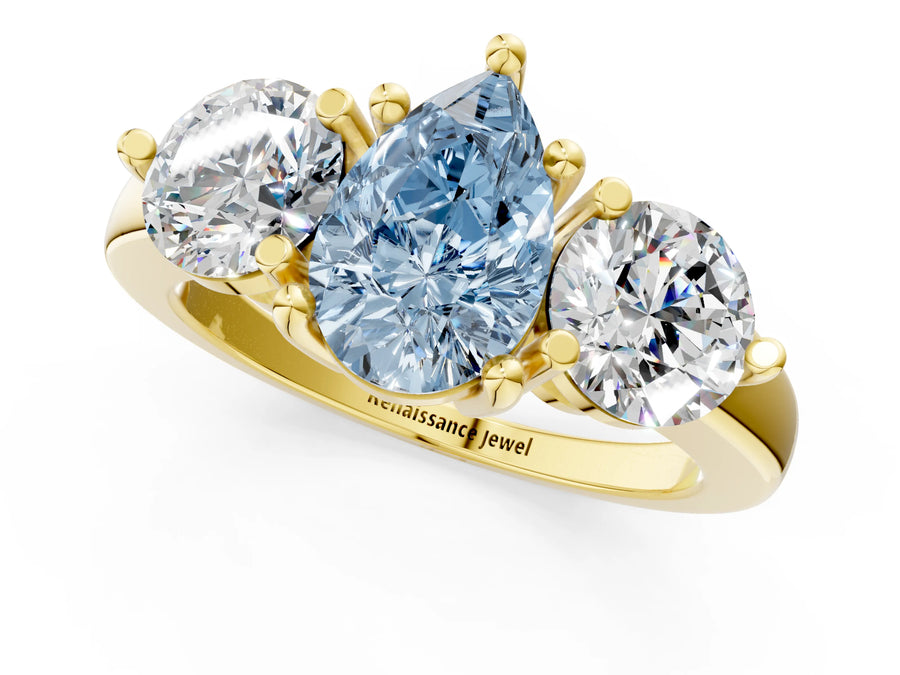 Yellow gold Three-Stone Fancy Blue Pear  Brilliant Cut Solitaire Ring with Prong Setting on a Classic Band