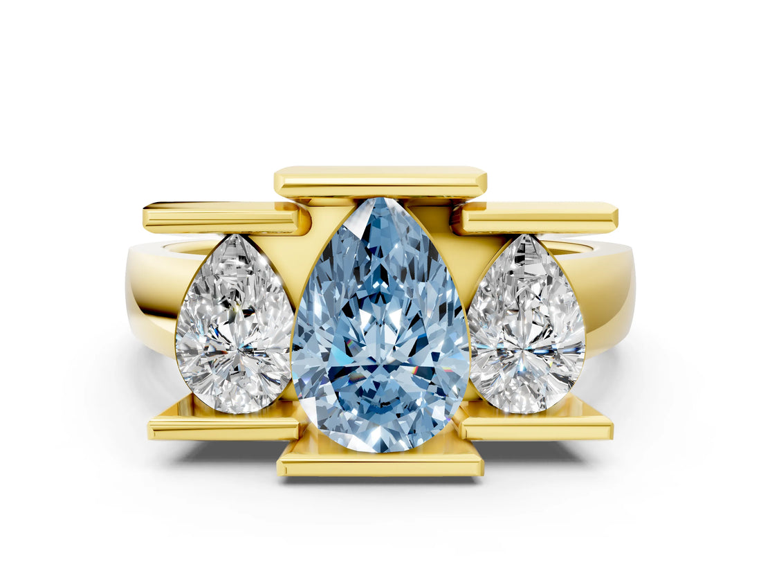 Yellow gold Three Stone Fancy Blue Pear Cut Cut Channel Set Diamond Ring