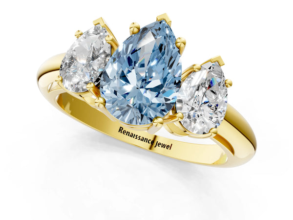 Yellow gold Three-Stone Fancy Blue Pear Cut Cut Diamond Engagement Ring with Prong Setting on a White Gold Band