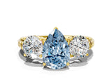 Yellow gold Three-Stone Fancy Blue Pear Cut Cut Diamond Ring with Channel-Set Band and Prong Setting