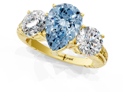 Yellow gold Three-Stone Fancy Blue Pear Cut Cut Diamond Ring with Channel-Set Band and Prong Setting_1