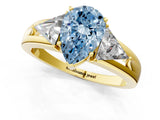 Yellow gold Three-Stone Fancy Blue Pear Cut Cut Diamond Ring with Trillion Side Stones on a Split Shank Band_1