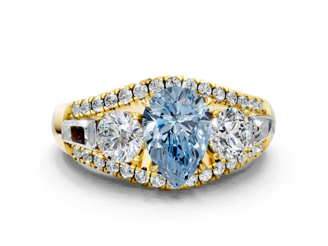 Yellow gold Three-Stone Fancy Blue Pear Cut Diamond Engagement Ring with Pave Band and Prong Setting