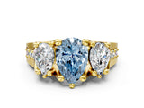 Yellow gold Three-Stone Fancy Blue Pear  Cut Diamond Ring with Channel-Set Band and Four-Prong Setting_49