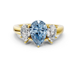 Yellow gold Three-Stone Fancy Blue Pear  Cut Diamond Ring with Channel-Set Band and Four-Prong Setting_78