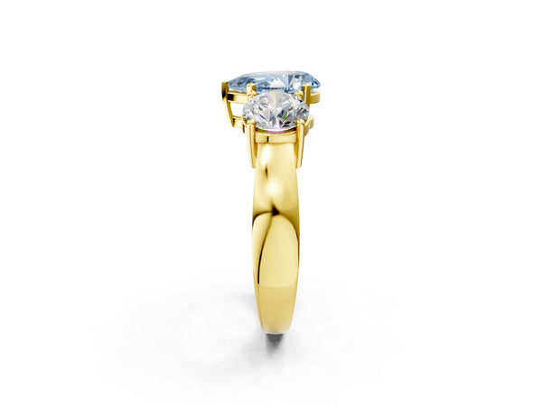 Yellow gold Three-Stone Fancy Blue Pear Cut Diamond Ring with Round Side Stones, Classic Band, and Four-Prong Setting
