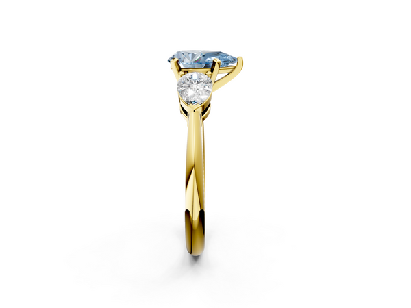 Yellow gold Three-Stone Fancy Blue Pear Cut Diamond Ring with Pear Side Stones and Four-Prong Setting