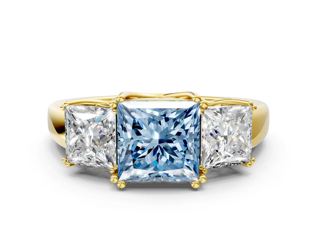Yellow gold Three-Stone Fancy Blue Princess Cut Cut Diamond Ring with Channel Set Band and Four-Prong Setting