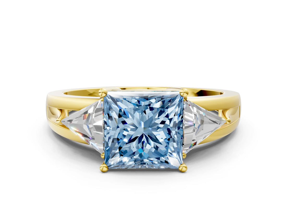 Yellow gold Three-Stone Fancy Blue Princess Cut Cut Diamond Ring with Trillion Side Stones on a Split Shank Band