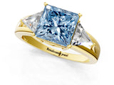 Yellow gold Three-Stone Fancy Blue Princess Cut Cut Diamond Ring with Trillion Side Stones on a Split Shank Band_1