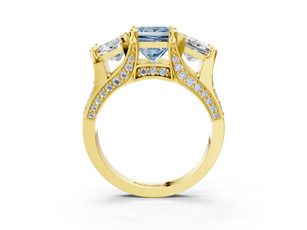 Yellow gold Fancy Blue Princess Cut Diamond Three-Stone Ring with Channel Set Band and Four-Prong Setting